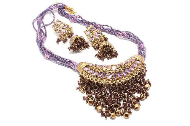 IMAGE: http://i827.photobucket.com/albums/zz198/SitaraPhotos/Lightbox/LilacKundan2.jpg